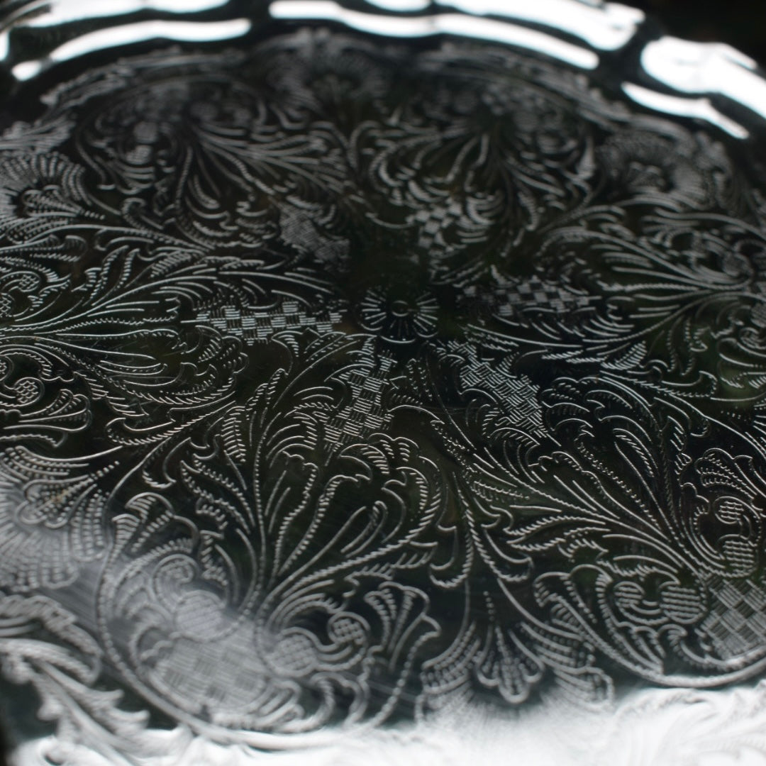 Vintage silver plated spell plate